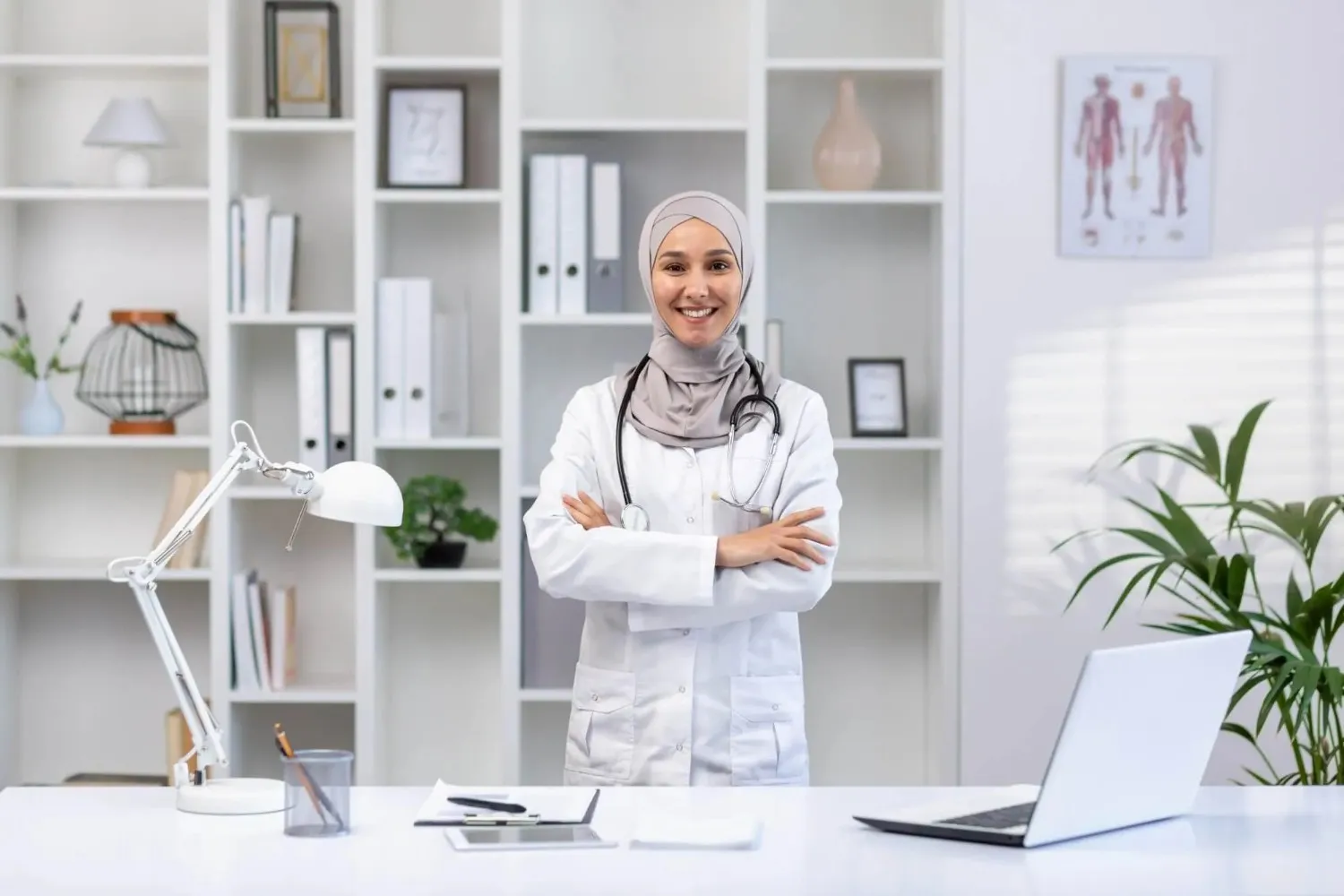 A female healthcare provider standing confidently in a professional medical office
